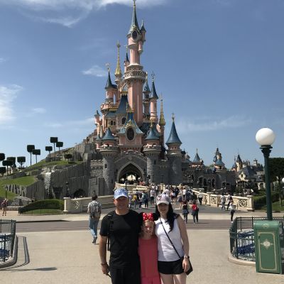 In front of the castle in Disneyland Paris. My daughter's first Disney experience.
